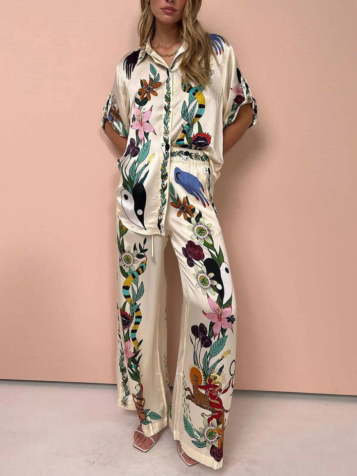 Nika | Conjunto de Camiseta e Calças Satin com Estampado Único Vibes de Resort
