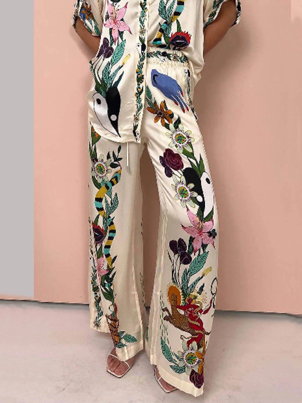 Nika | Conjunto de Camiseta e Calças Satin com Estampado Único Vibes de Resort