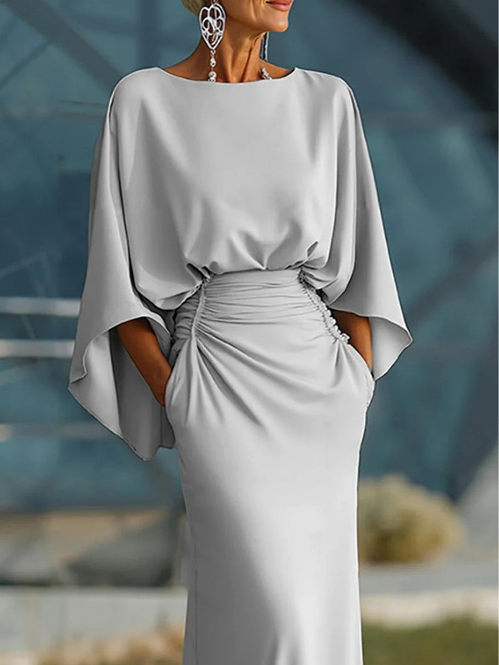 Clara | Vestido elegante de decote em V, costas nuas e sem mangas