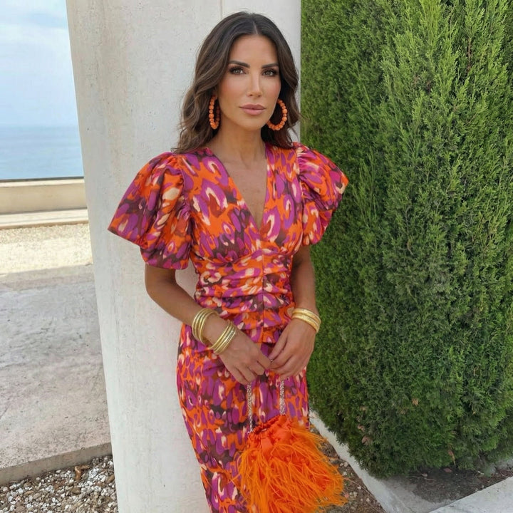 Ani – Vestido elegante com mangas bufantes marcantes